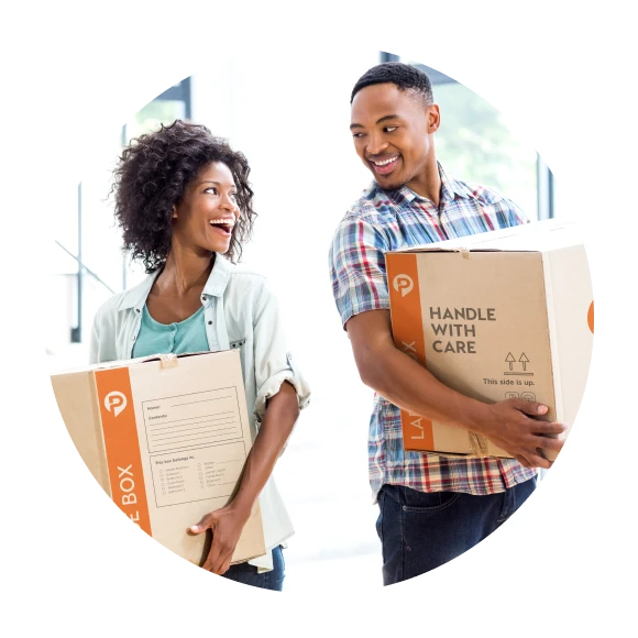 Women and man holding Pockit Self Storage moving boxes
